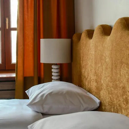 Merlini W Sercu Starego Miasta, Grodzka 19