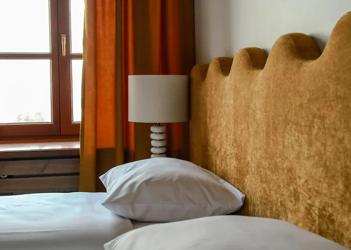 Merlini W Sercu Starego Miasta, Grodzka 19