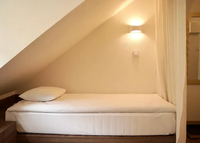 Merlini W Sercu Starego Miasta, Grodzka 19 3*