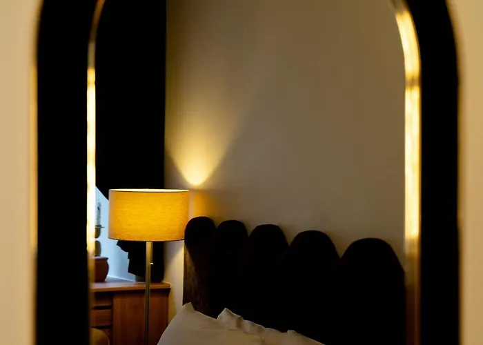 Merlini W Sercu Starego Miasta, Grodzka 19